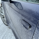 a blue 2023 porsche 911 carrera on a snow-covered road in michigan